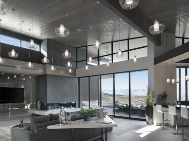 The home’s inner sanctum lounge features fantastic views through massive glass doors and clerestory windows.