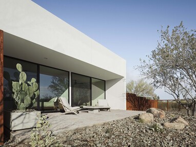 The Series 600 windows in the master bedroom looks out into the Sonoran Desert landscape.