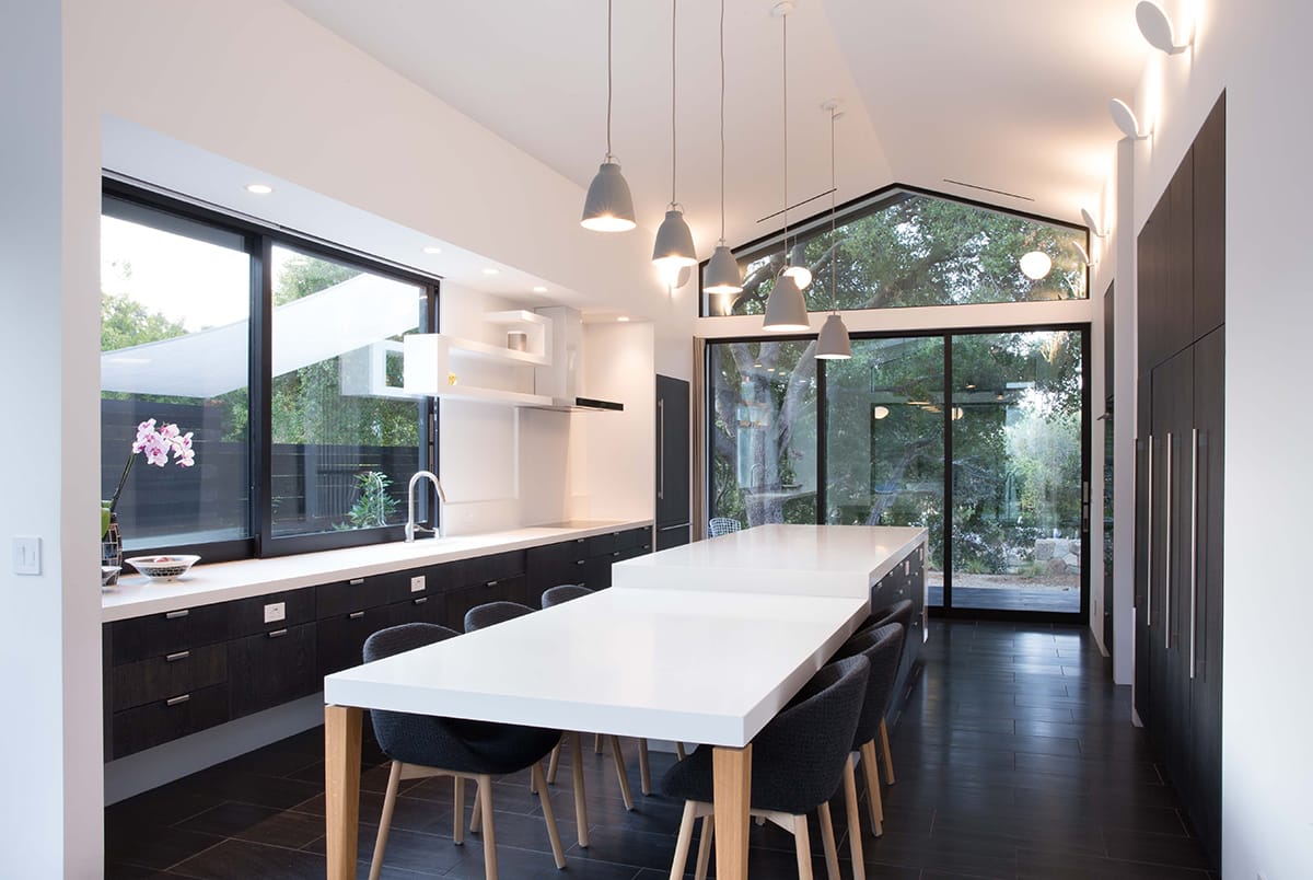 The kitchen benefits from a multi-slide door and a large operable window that let fresh Santa Barbara breezes course through the space.