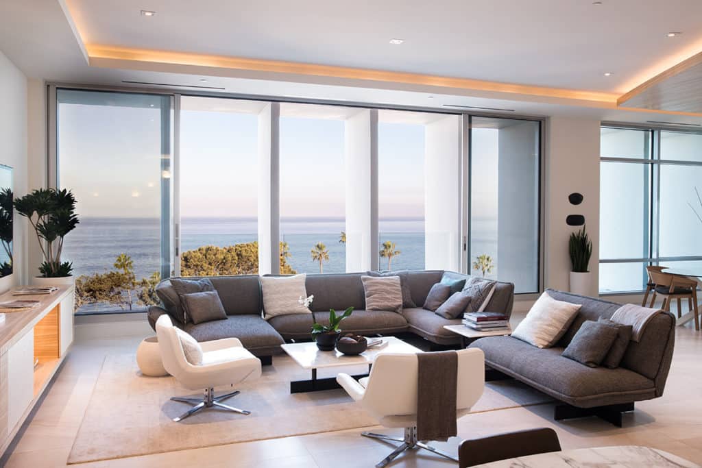 The open bi-parting multi-slide allows for the ocean breeze to refresh the sitting area.