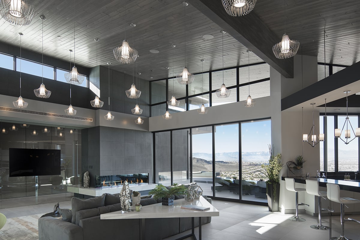 The home’s inner sanctum lounge features fantastic views through massive glass doors and clerestory windows.