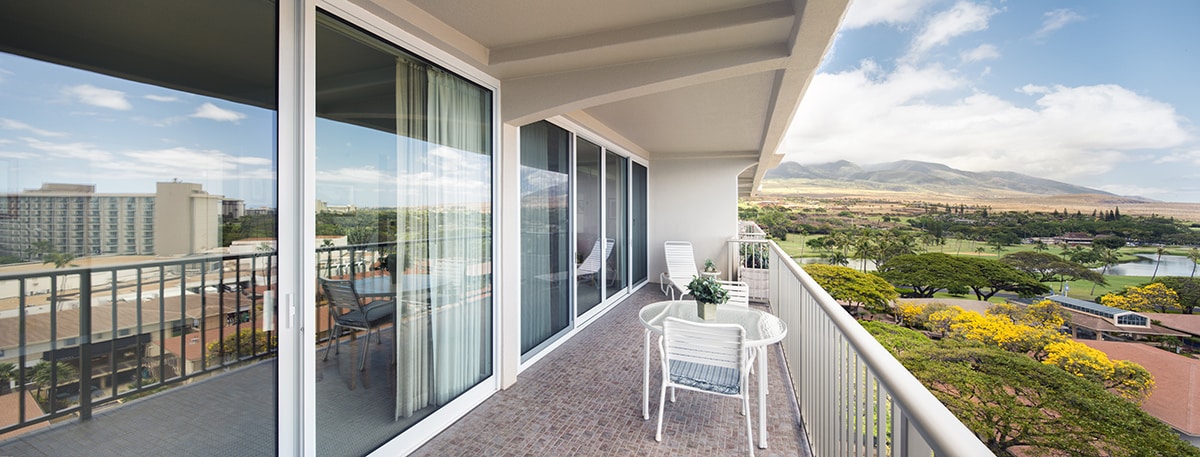 The wall-length multi-slide doors completely connect rooms to their balcony.