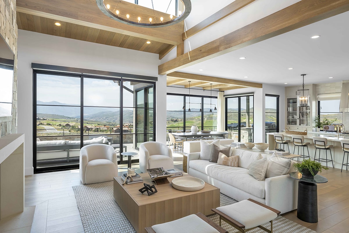 Simulated Steel windows throughout the house frame the landscape and let in scenic mountain views.