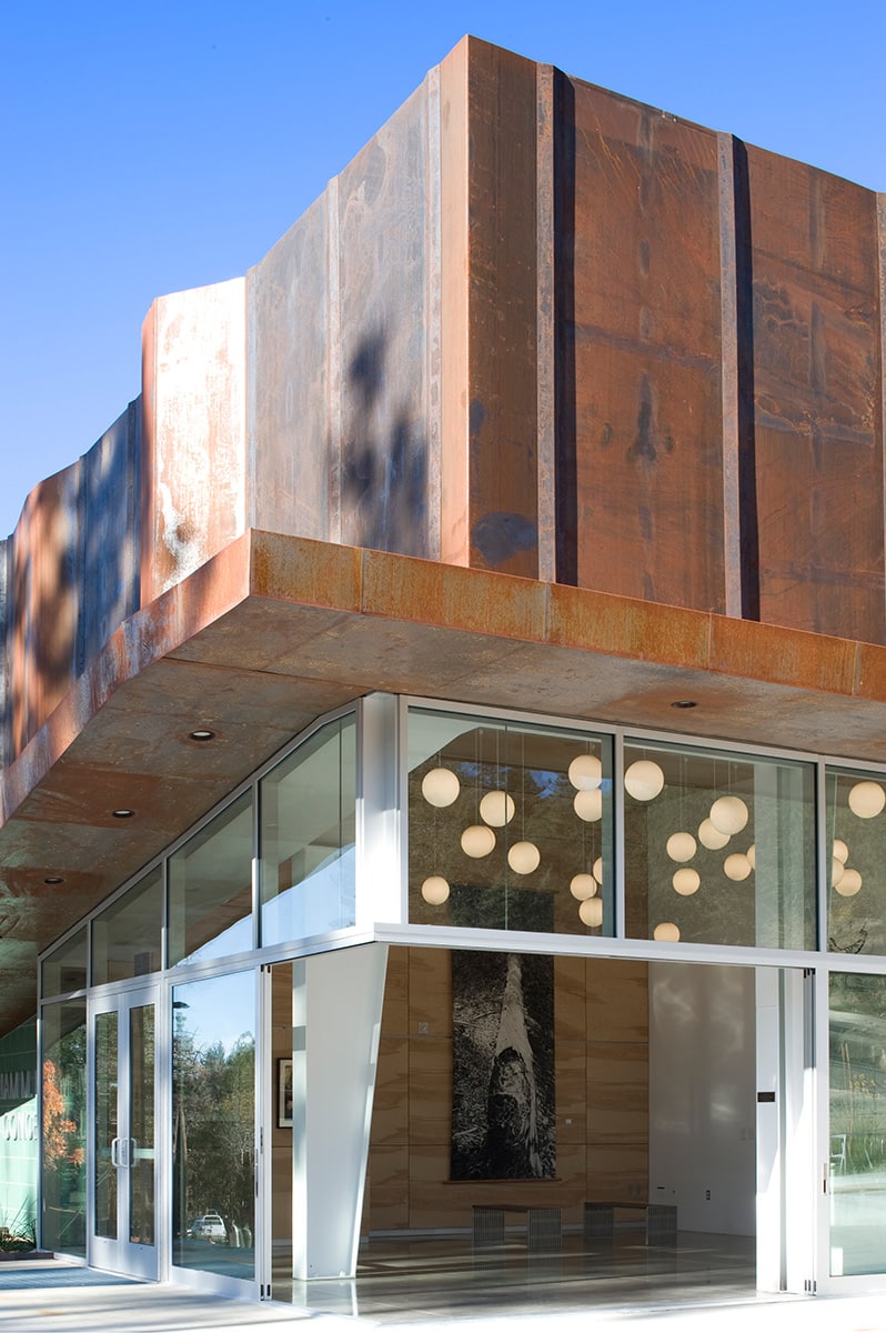 The corner multi-slide door seamlessly merges the indoors with the outdoors.
