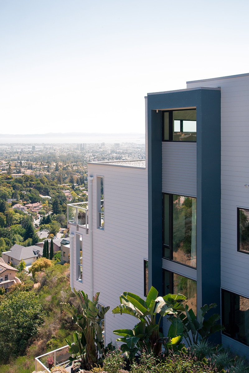A view of the massive windows on the top two stories of the home.