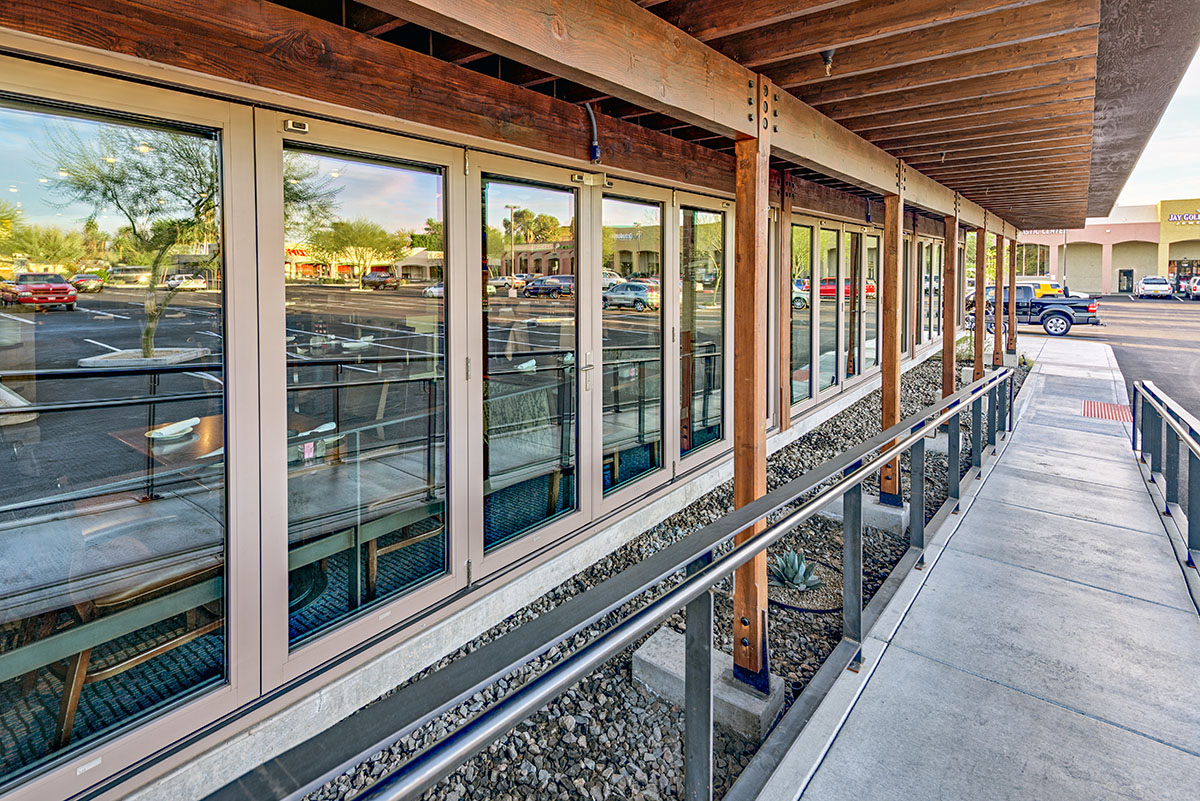 A view of the restaurant with it’s entire front façade of bi-fold doors.