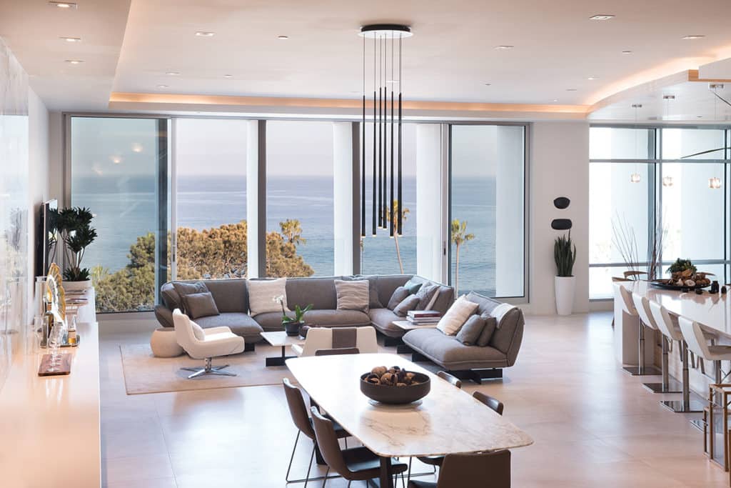 The condo's open floor plan is perfect for letting ocean breeze course through the space when the multi-slide doors are open.