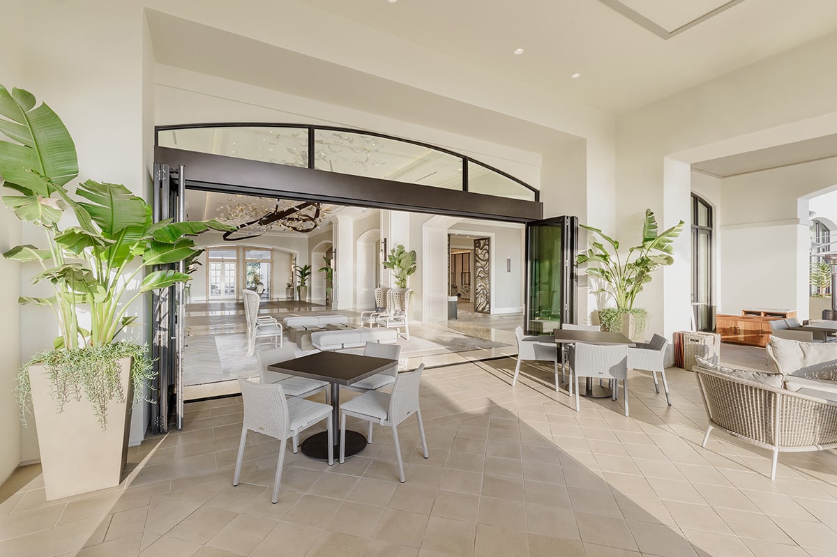 A view of the open bi-fold door from the covered balcony.