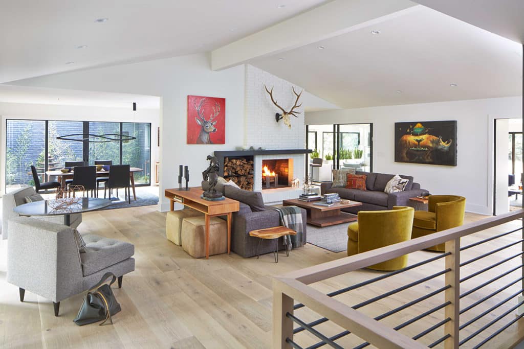 The great room connects to the sunroom through the large sliding glass doors.