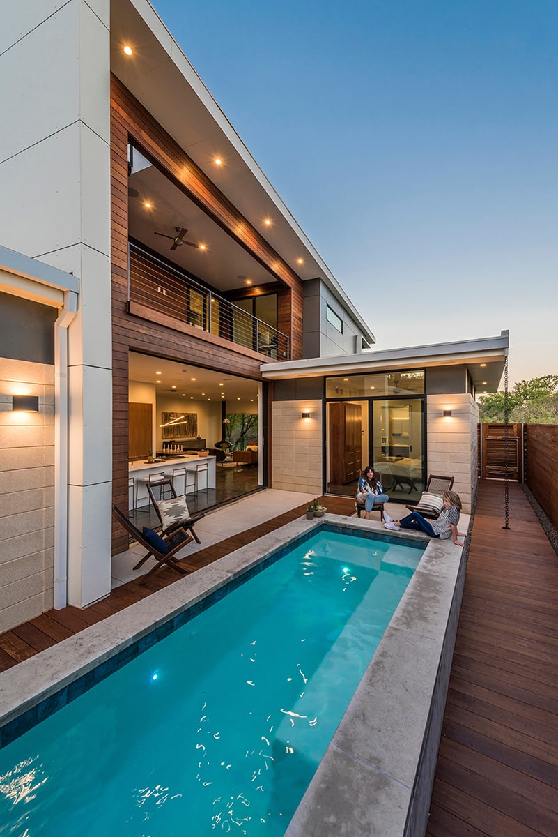 To expand the space at the back of the home, architect Michael Gooden used a 15-foot by 10-foot multi-slide door that disappears into pockets.