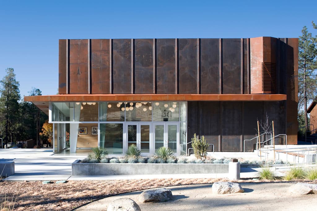 Loads of natural light and fresh Idyllwild Valley air floods the concert hall’s lobby through the open multi-slide door.