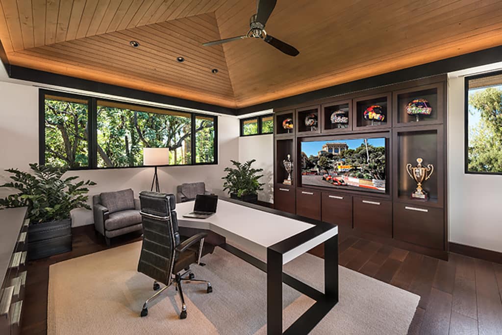 Fixed and operable windows bring light into rooms needing less light, like in this office space.