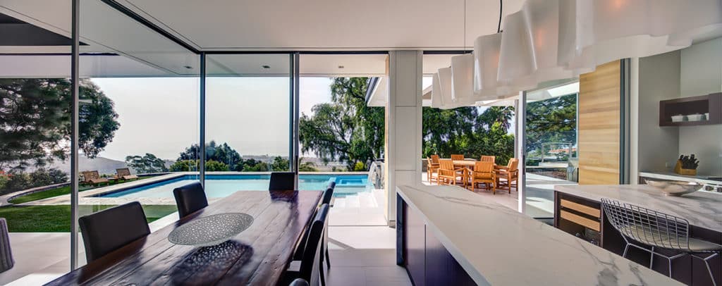 The kitchen and outdoor entertaining space become one when these multi-slides are open.