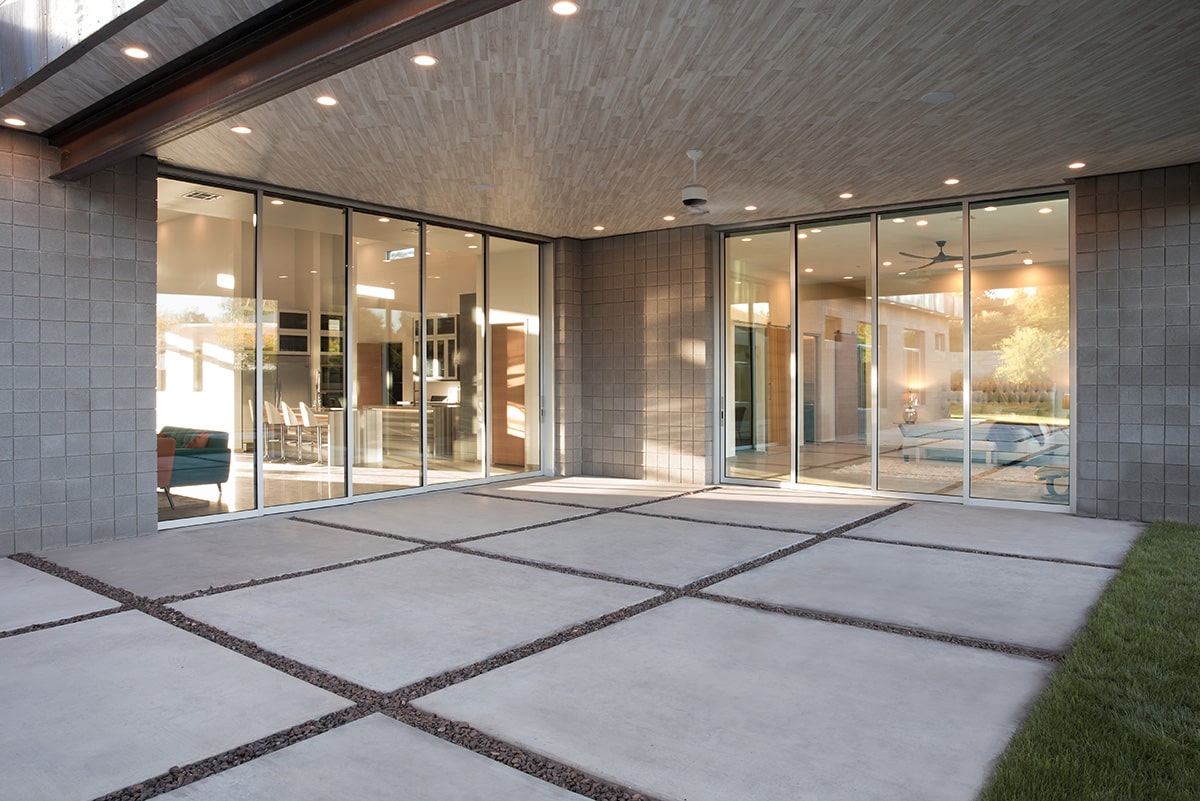 The multi-slide doors in the living room and master bedroom connect the spaces together with an outdoor patio.