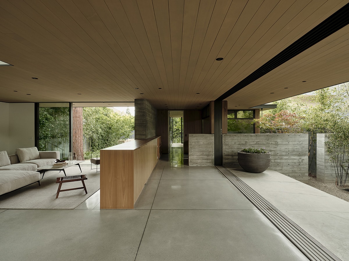 Almost half of the house is glass, including a retractable wall of glass doors in a great room that measures 40 by 20 feet.