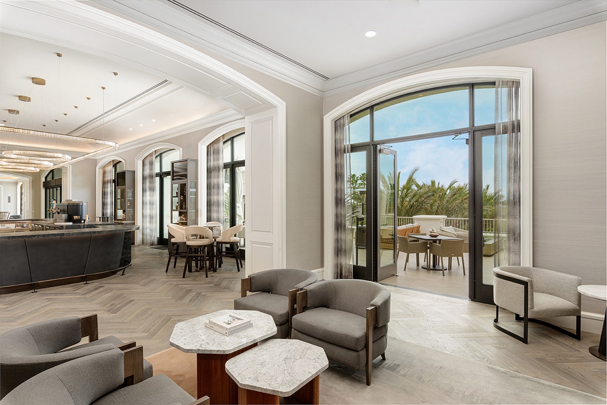 Hinged doors and fixed windows provide ample sunlight while maintaining symmetry throughout the resort.
