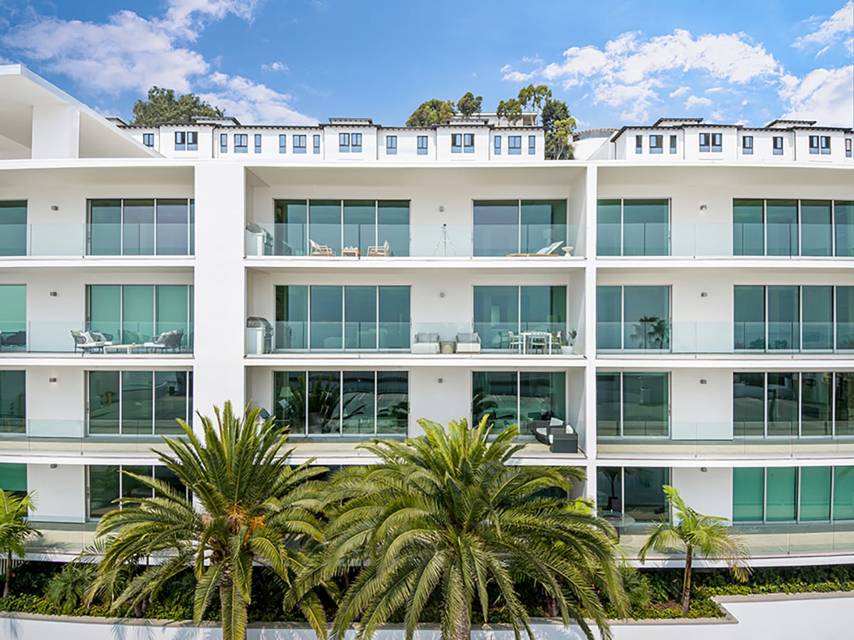 Every condo has a multi-slide door for the living room and a sliding door for the bedroom.