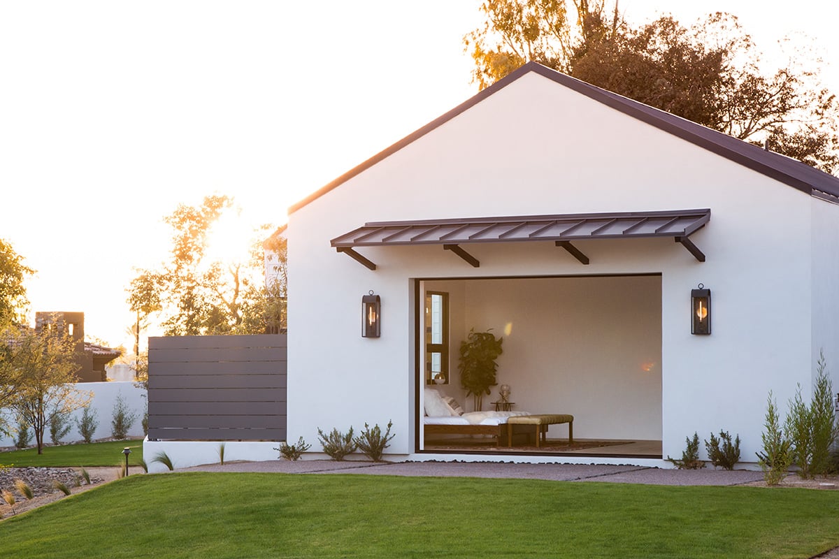 Arizona sunshine fills the master suite through the large opening created when the multi-slide door is completely open.