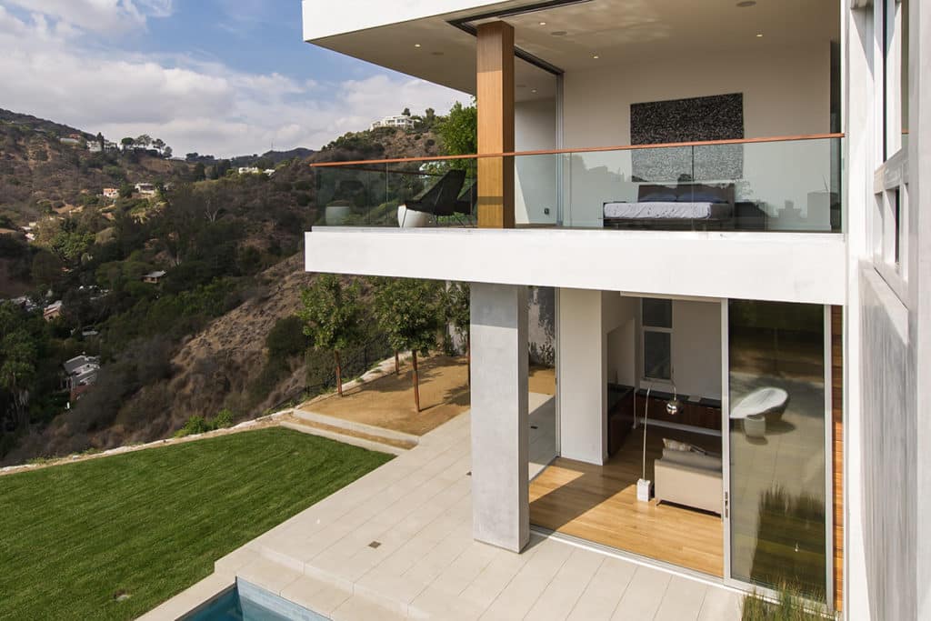 A view of the sloping, hill landscape from the home.