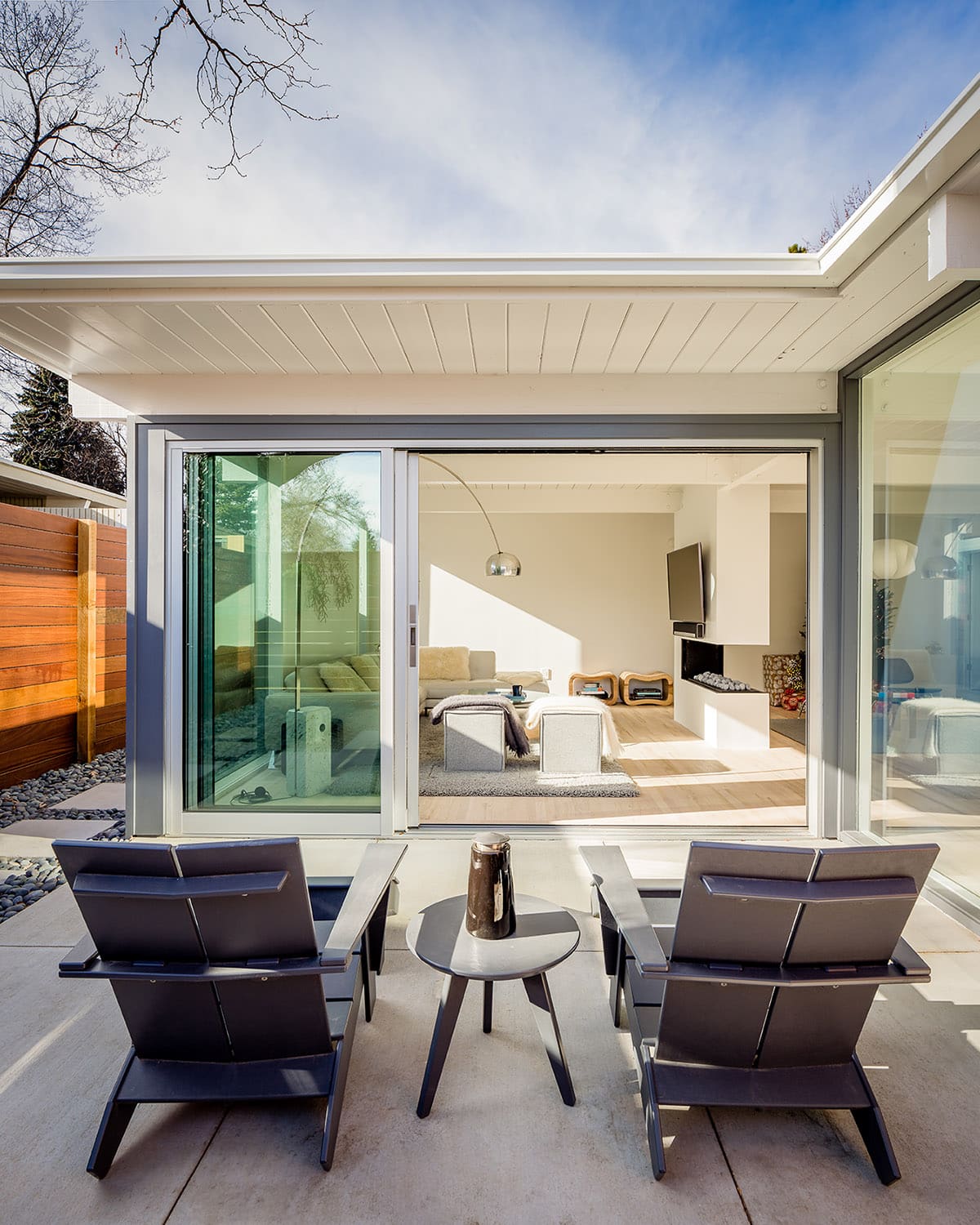 A stacking multi-slide opens the family room to the back patio.