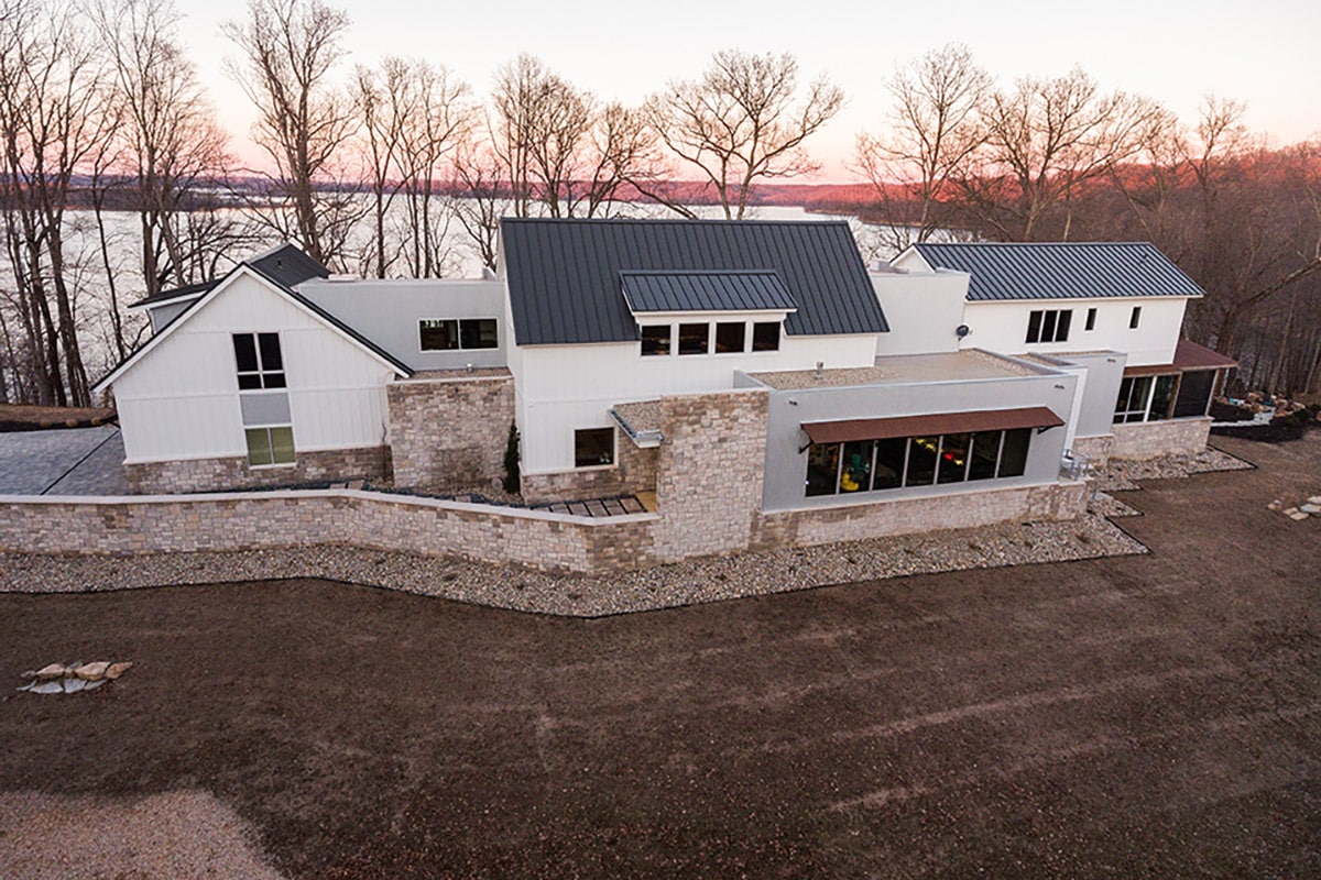 The 8,500-square-foot home features multi-slide doors and windows of all shapes and sizes.