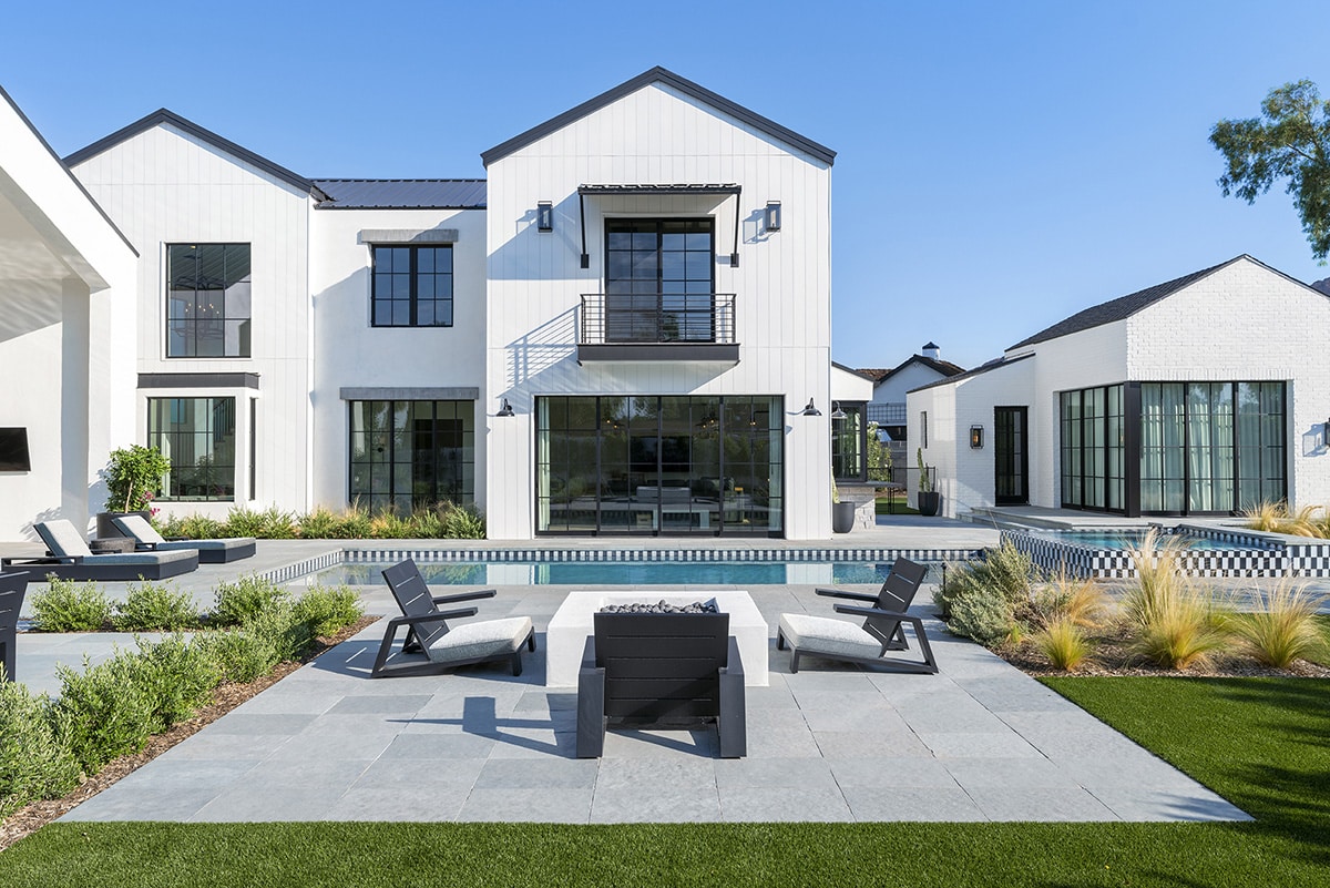 Big glass brings big glamour to the modern farmhouse style.