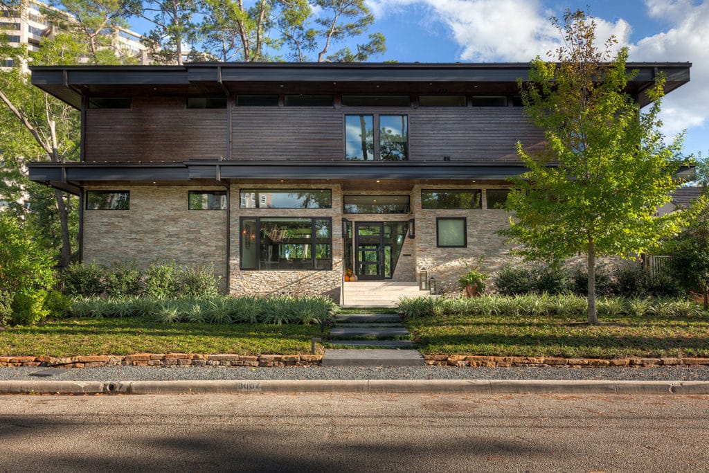 Clerestory windows in the front of the house offer a distinctively Wright-esque appearance.