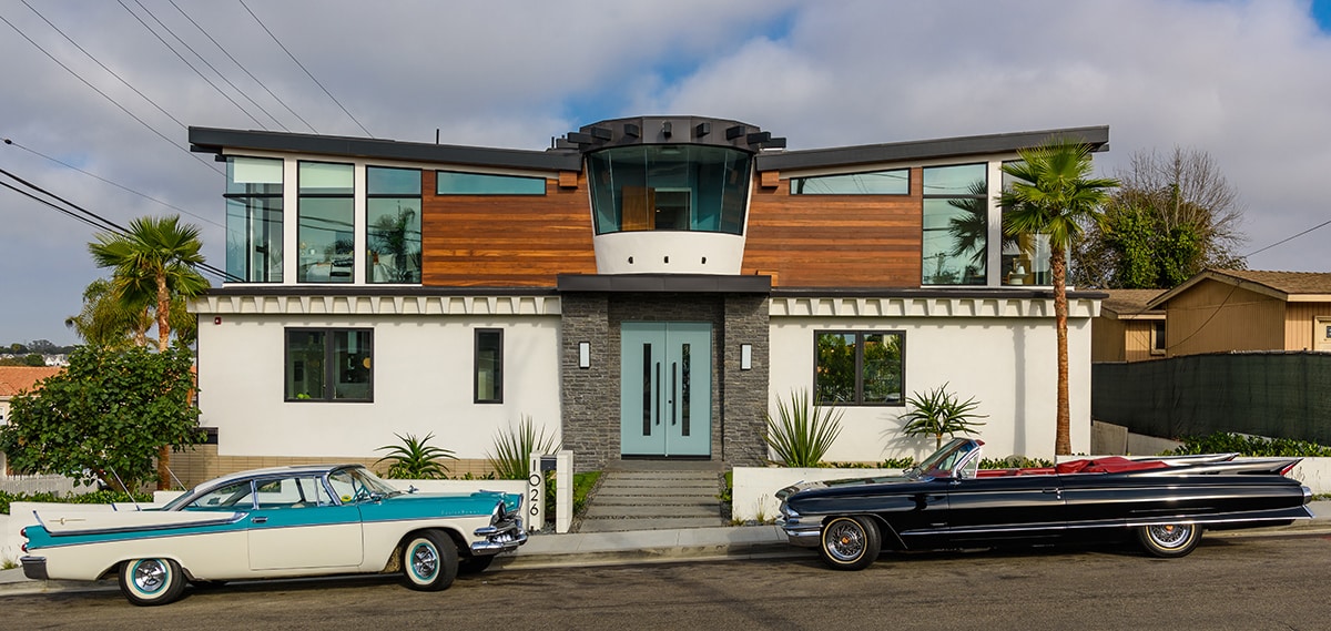 The unique frustum shape of the third floor along with the butterfly roof set the home apart from the rest.