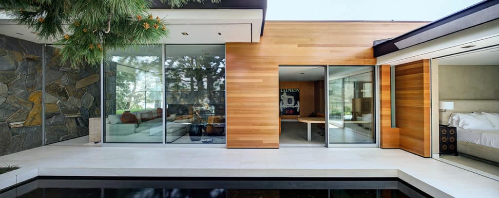 A pocketing multi-slide door opens the master bedroom to the backyard.