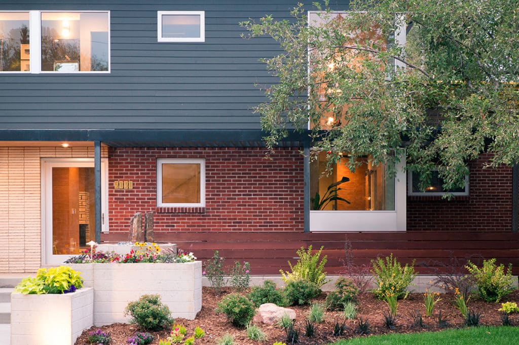 Customized door and window sizes add a unique look to the outside of the home with various window sizes.