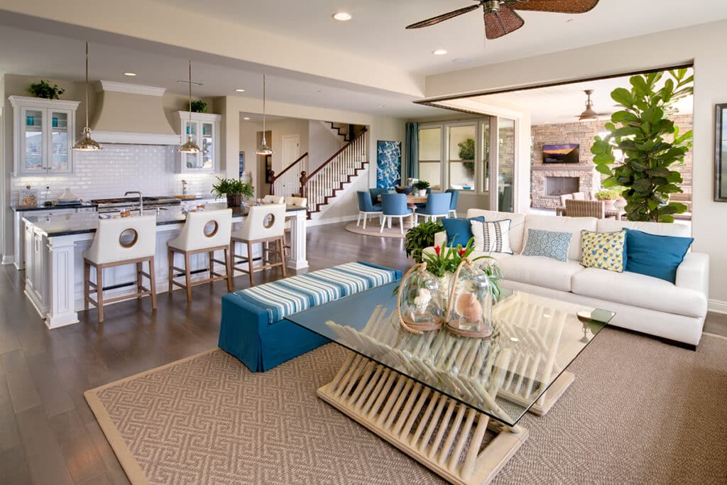 A 90-degree multi-slide glass door is pocketed to blur the lines between the interior of the home and the outdoor living areas.