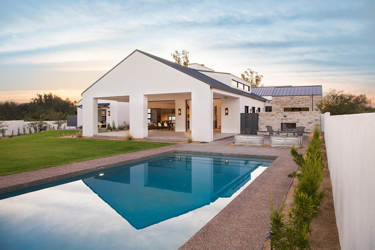 Multi-slides open to a huge covered outdoor living space, connecting the living room and dining room to the backyard.