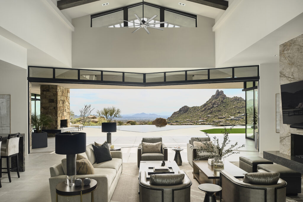 Interior view of a living room with fully opened Series 600 multi-slide doors.