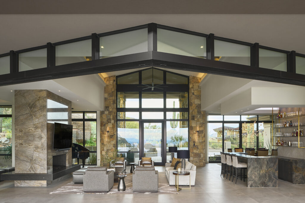 Interior view of a home entryway with a Series 900 hinged door encased in glass.