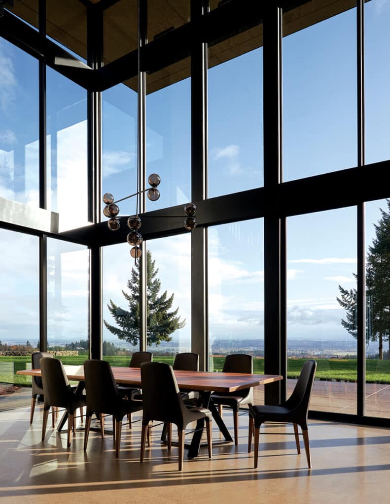 A view of the backyard from the dining room’s massive glass wall.