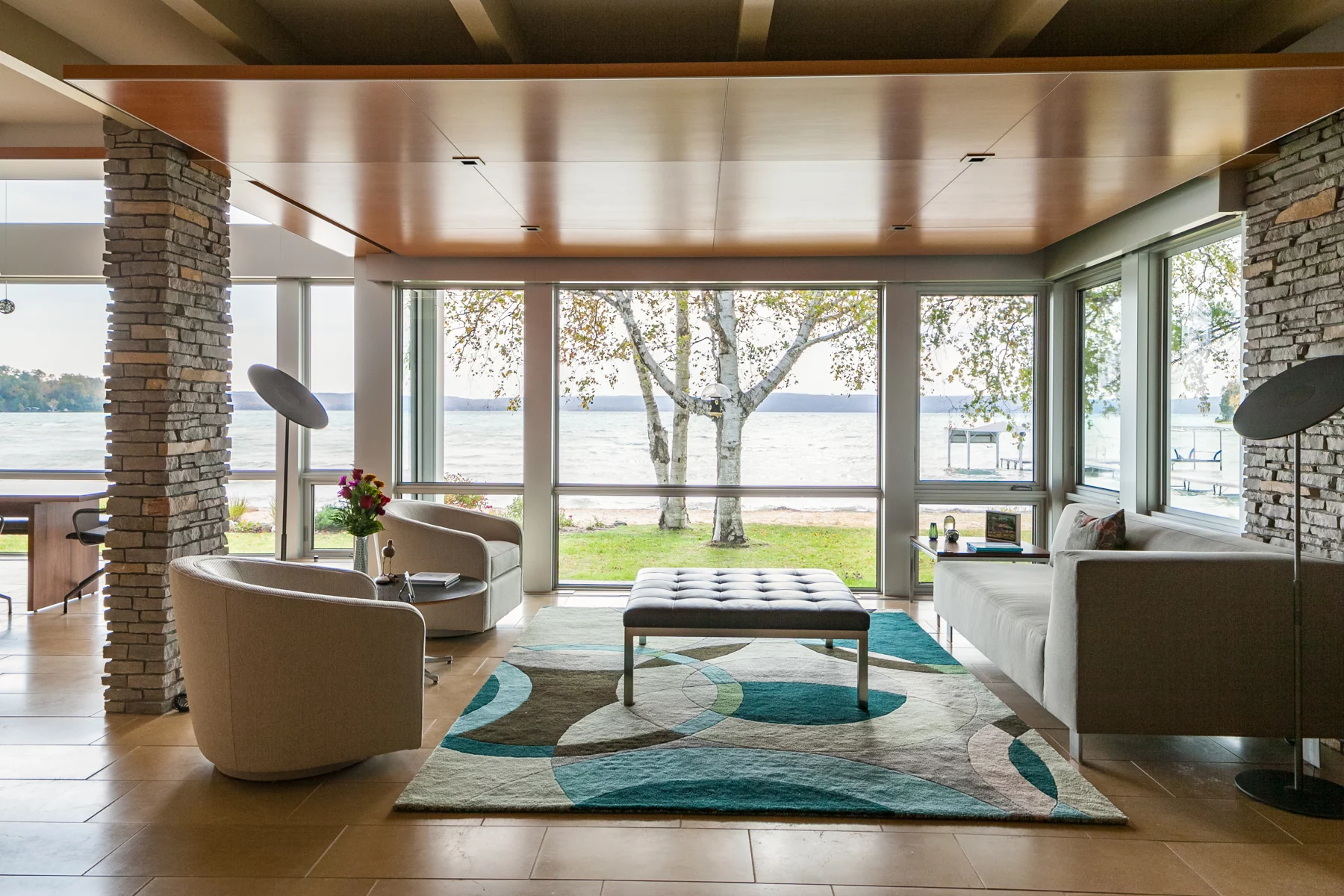 Fixed and operable windows let in natural lightinto the living roomduring the summer and provide maximum energy efficiency during Michigan's long, cold winters.
